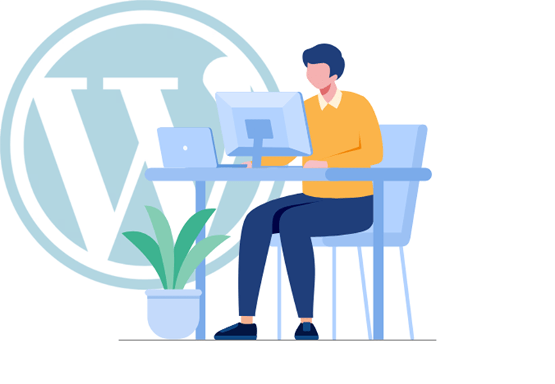 Een WordPress front-end programmeur zit aan een bureau en werkt op een laptop